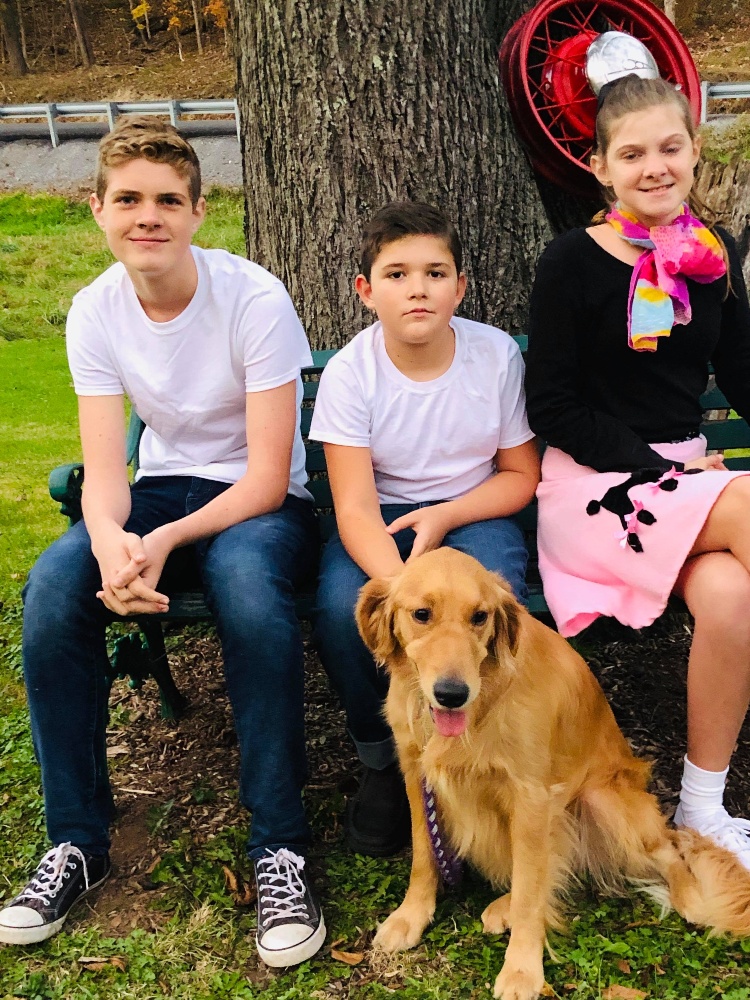 Jessie's 16-year-old brother, her younger brother and his service dog, and Jessie