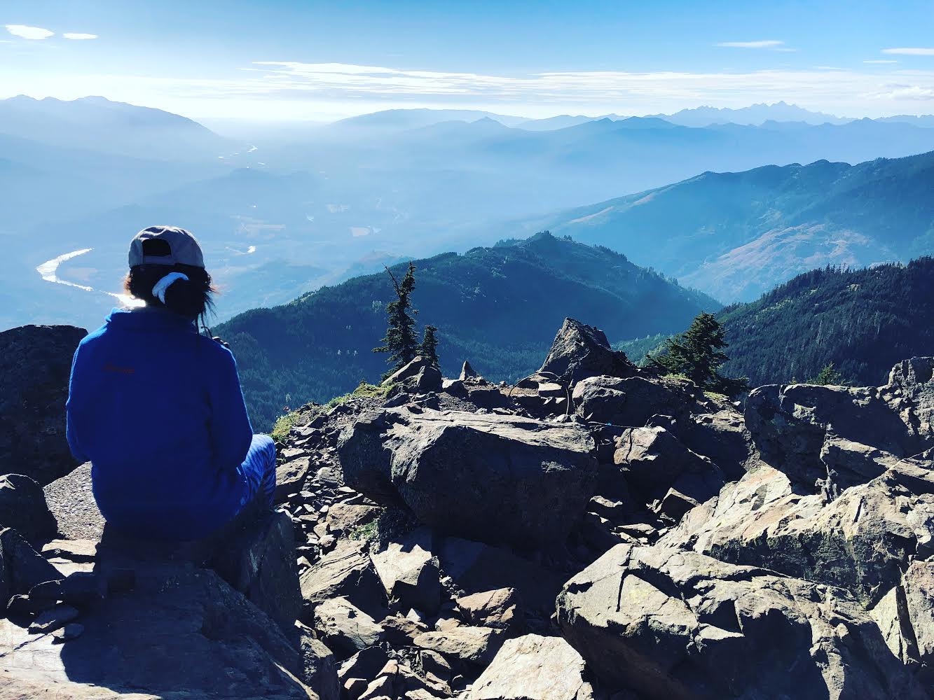 Raele at the top of Sauk Mountain following a successful climb to the summit