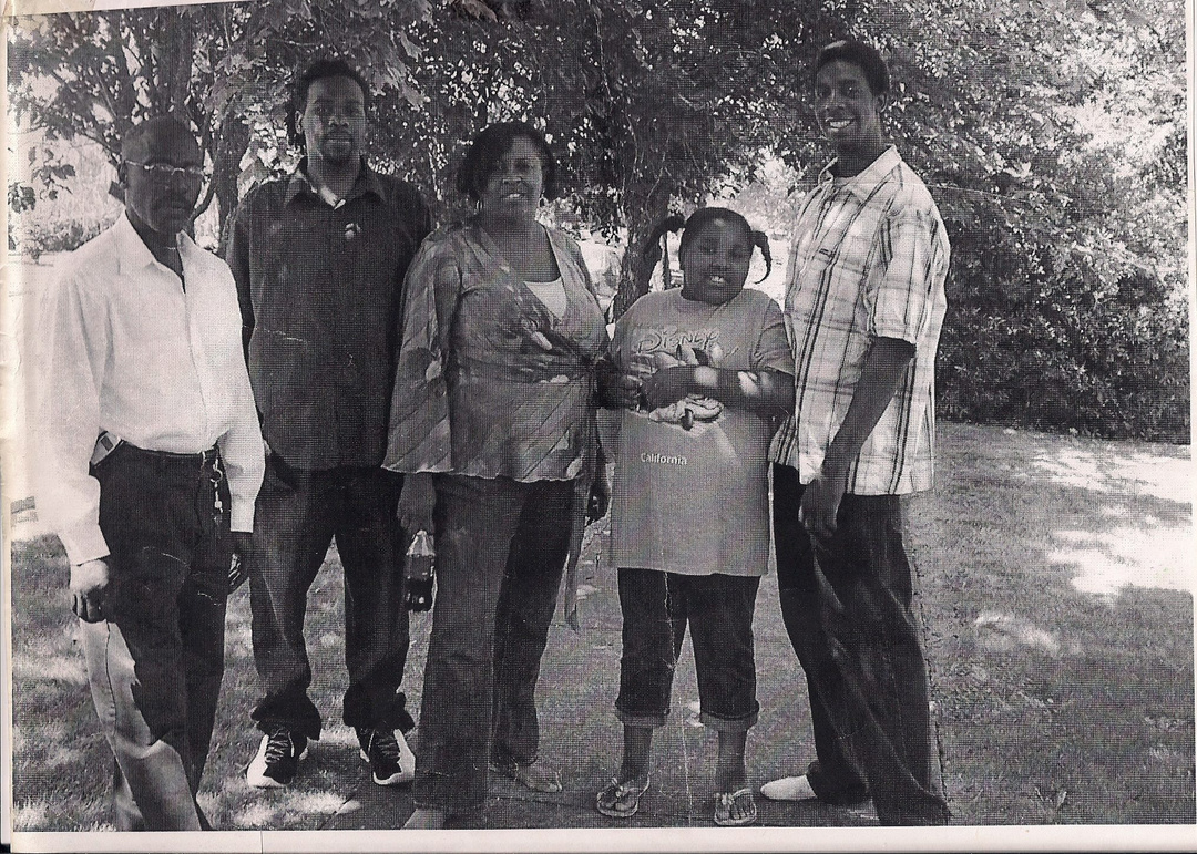 Erion with his uncle, brother, mom, and sister