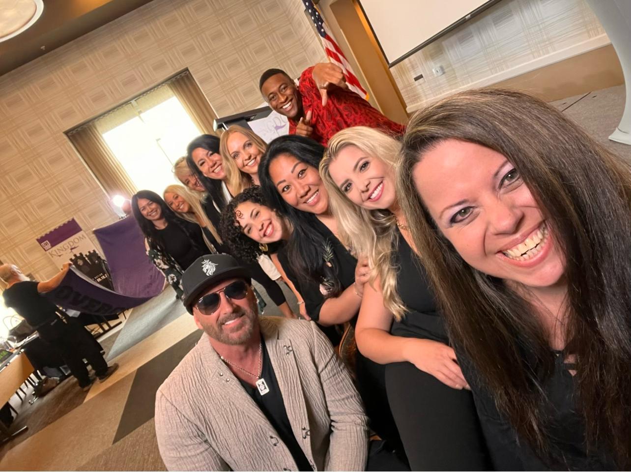 Maria and her fellow wealth coaches at trainings in California
