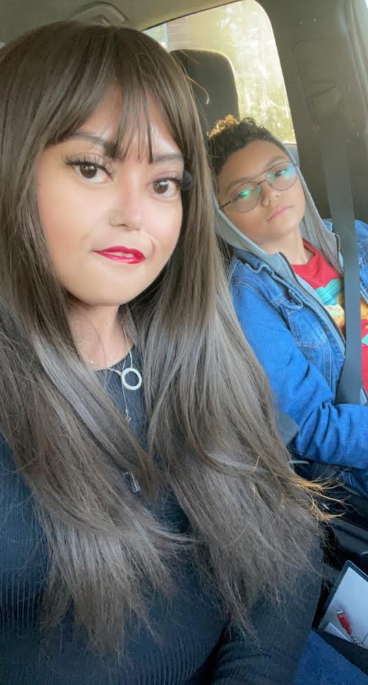 Elesha with her son in the car