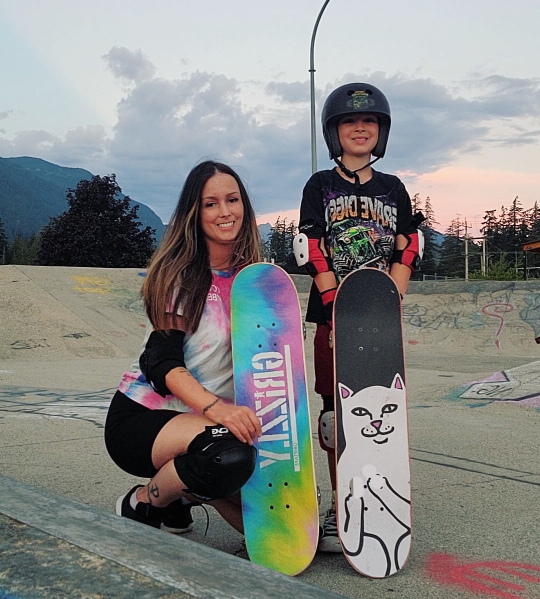 Sarah skateboarding with her son