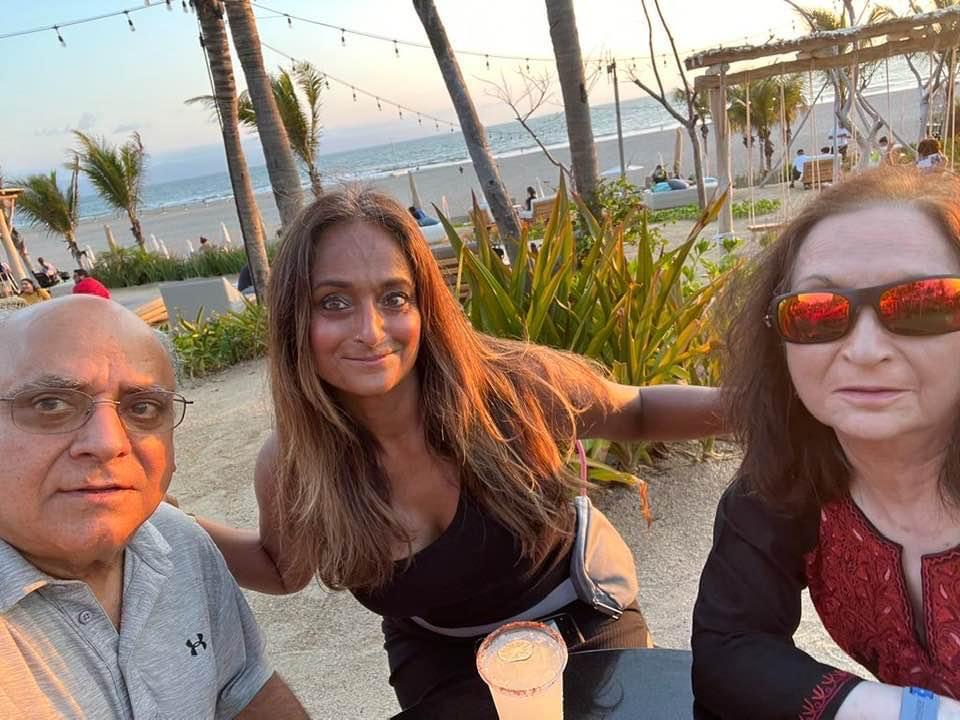 Natasha with her mom and dad on vacation in Nuevo Vallarta, Mexico