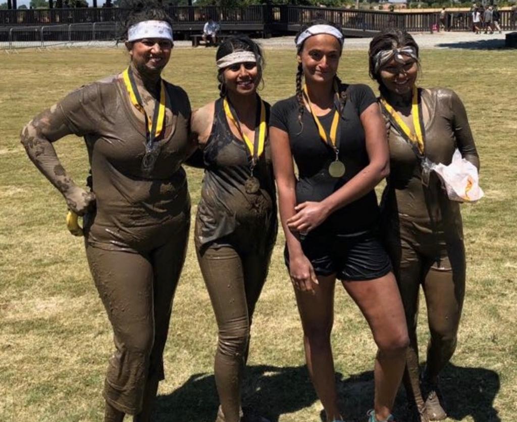 Natasha and her friends after a mud run obstacle course in Tracy, California