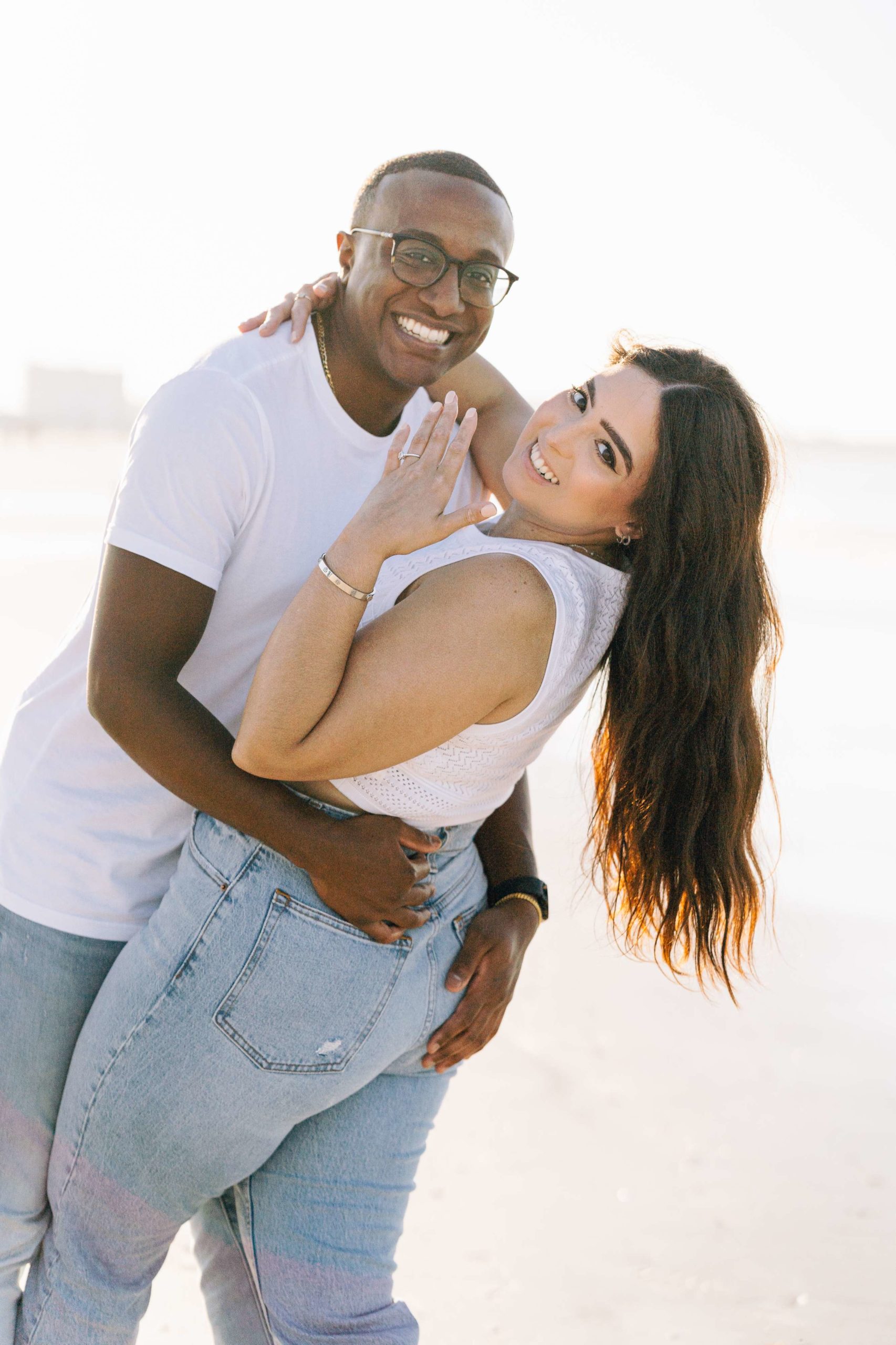Aneila and Jerome are engaged! Jerome surprised Aneila with a beach proposal in Sarasota, FL because he knows how beaches hold a special place in Aneila’s heart!
