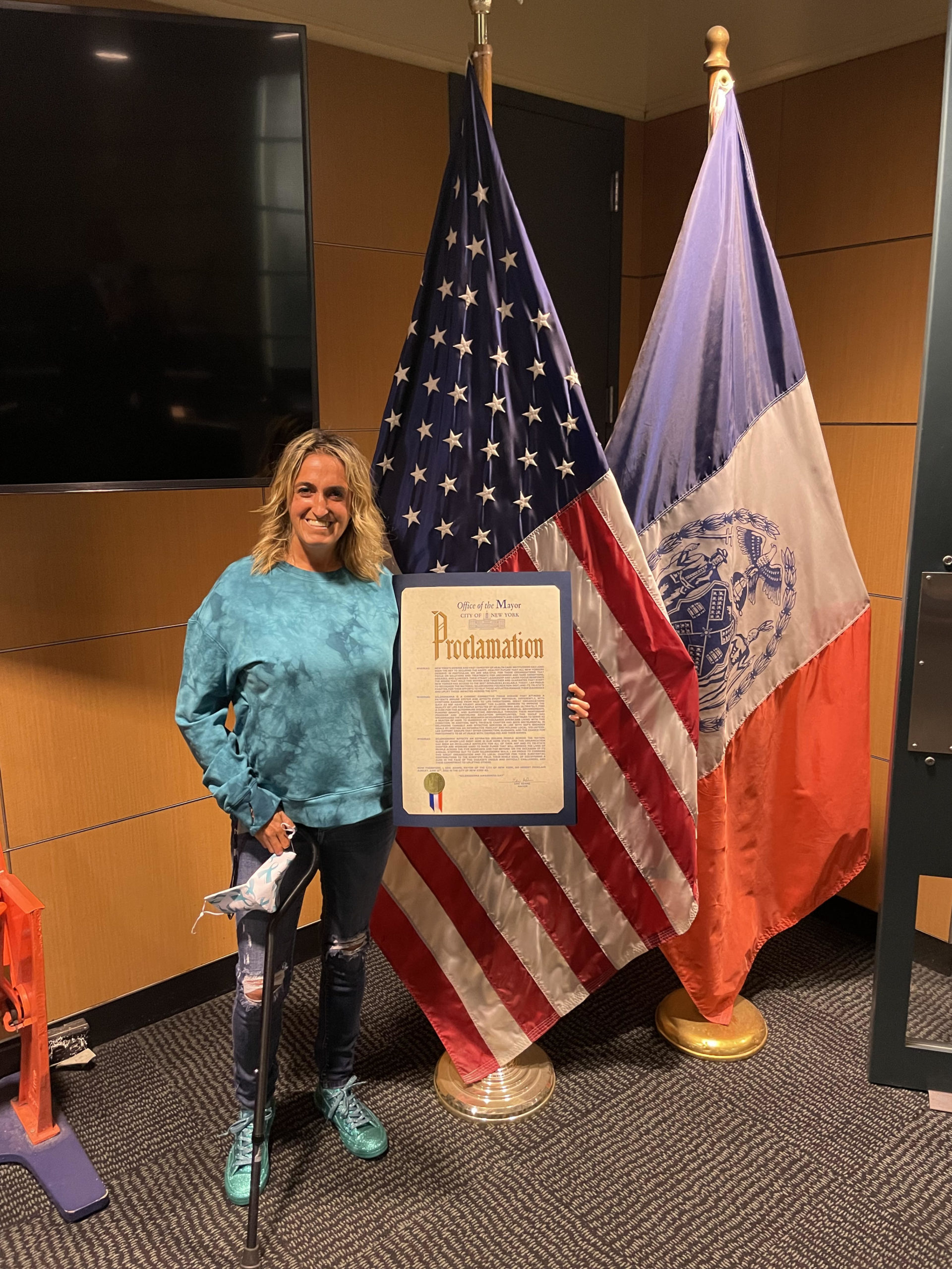 Evamarie receiving the Proclamation for World Scleroderma Day from NYC Mayor Adams